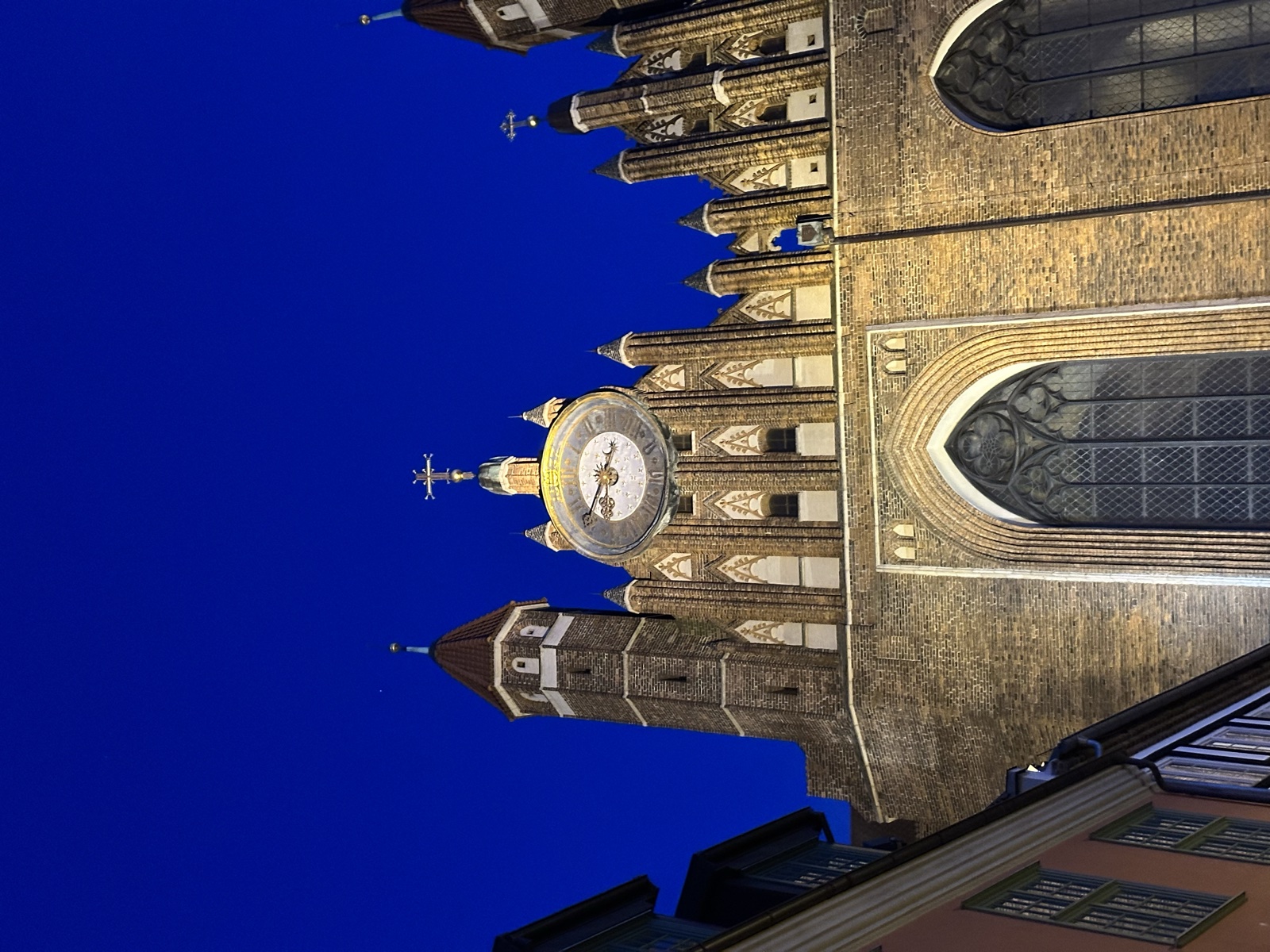 The Main Town Hall clock tower at night — Gdańsk's gothic silhouette